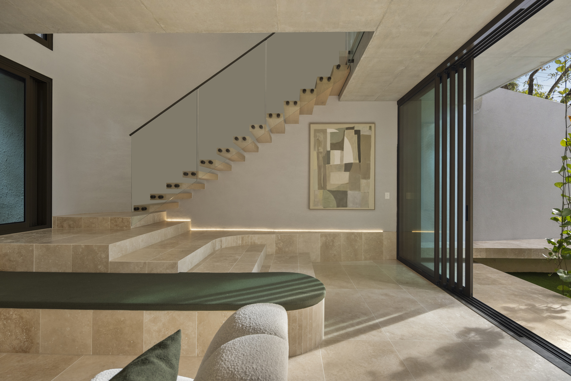 Floating timber staircase and stone platform