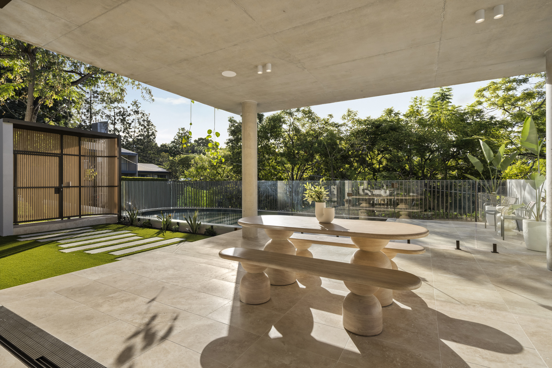 Poolside dining terrace at Sabre House